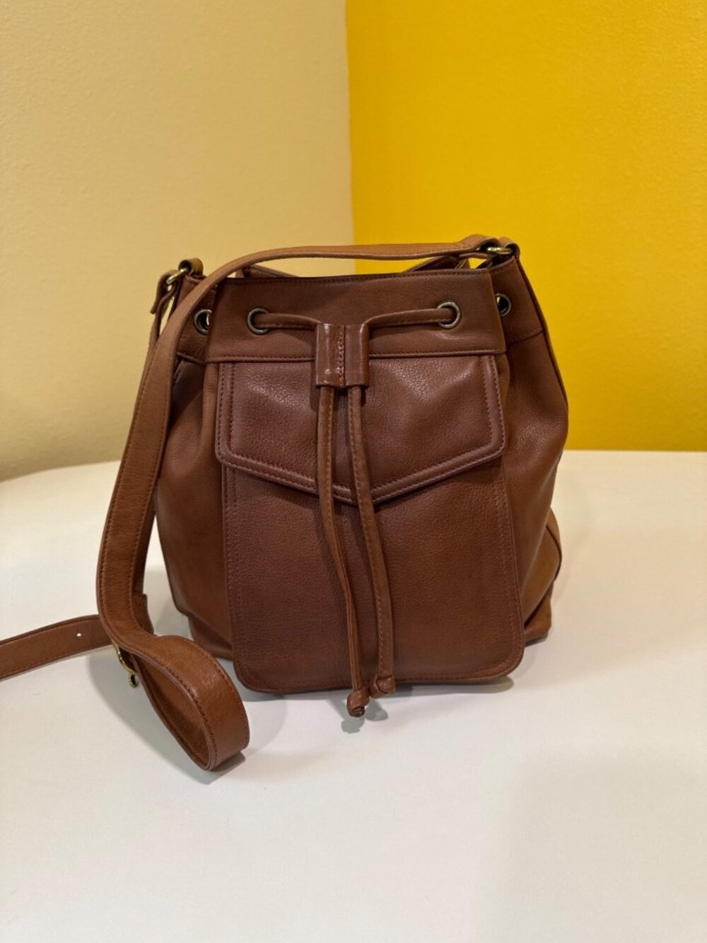Fossil Brown Leather Drawstring Bucket Bag With Adjustable Strap & Front Pocket